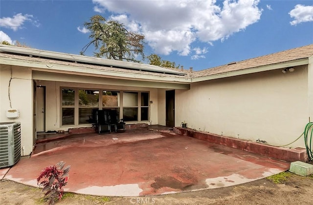 view of patio with central AC unit