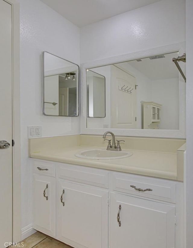 bathroom featuring vanity and tile patterned floors