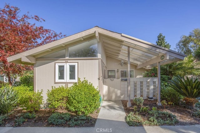 view of property exterior with ceiling fan