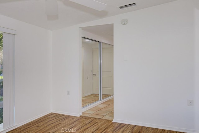 empty room with light wood-type flooring