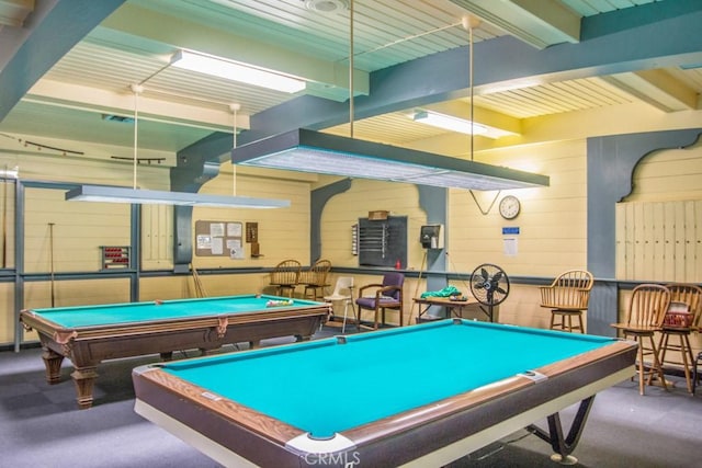 playroom with beam ceiling, wooden walls, and billiards