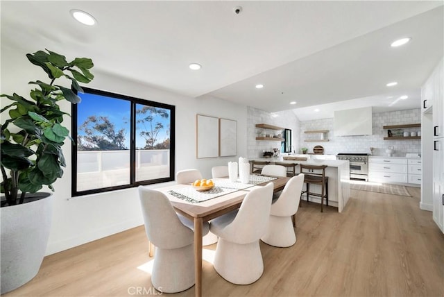 dining room with light wood-type flooring