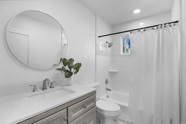 full bathroom with toilet, vanity, and shower / bathtub combination with curtain