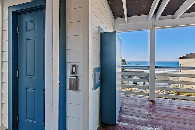 property entrance with a water view