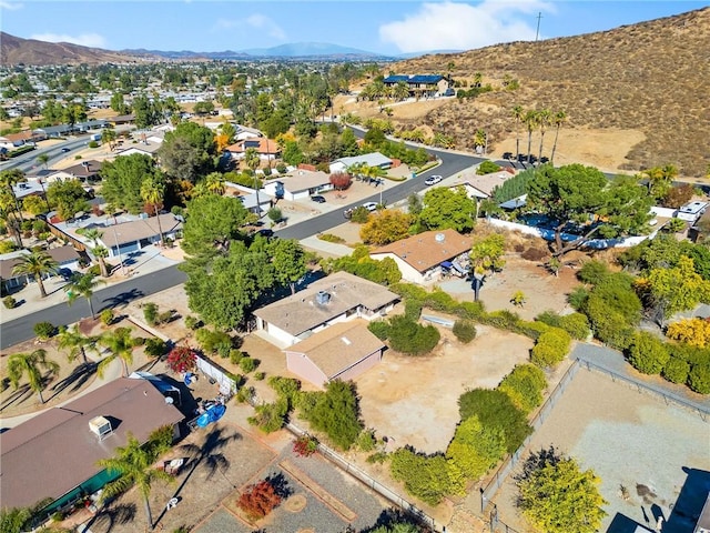 birds eye view of property featuring a mountain view