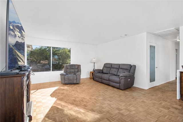 living room featuring light parquet flooring