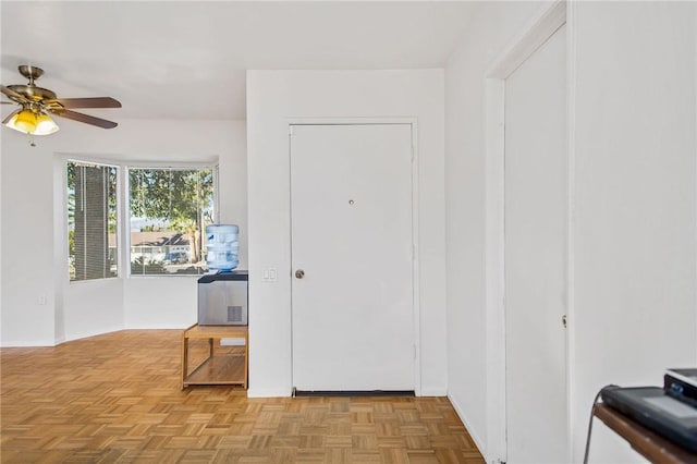 entryway featuring light parquet flooring and ceiling fan