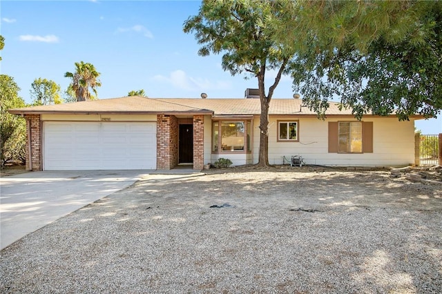 ranch-style home with a garage