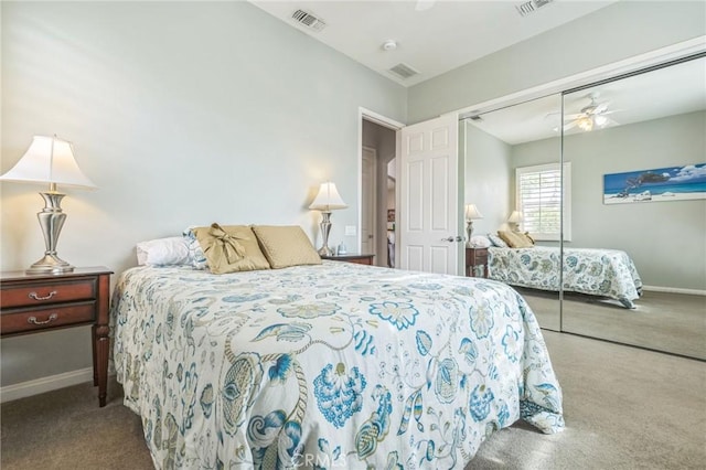 bedroom featuring carpet flooring, ceiling fan, and a closet