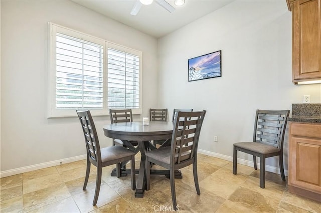 dining area with ceiling fan