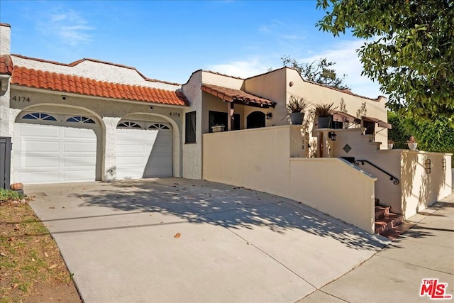 view of front of house with a garage