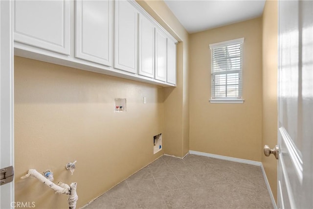 laundry area with hookup for a gas dryer, baseboards, washer hookup, and cabinet space