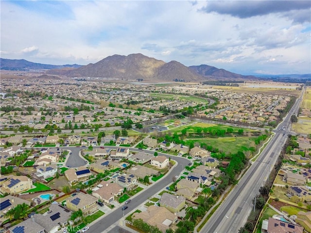 birds eye view of property with a residential view and a mountain view