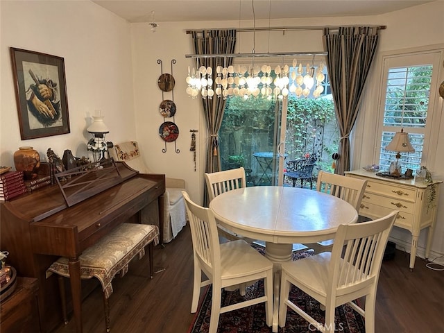 dining area featuring dark hardwood / wood-style floors