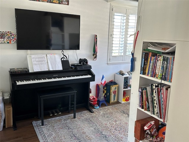 miscellaneous room featuring hardwood / wood-style flooring