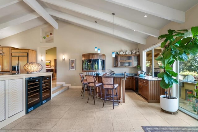 kitchen featuring a breakfast bar, hanging light fixtures, wine cooler, light tile patterned floors, and beamed ceiling