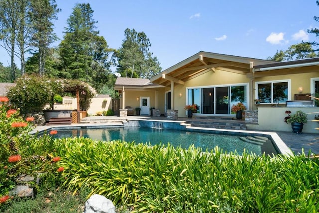 back of house featuring a patio area