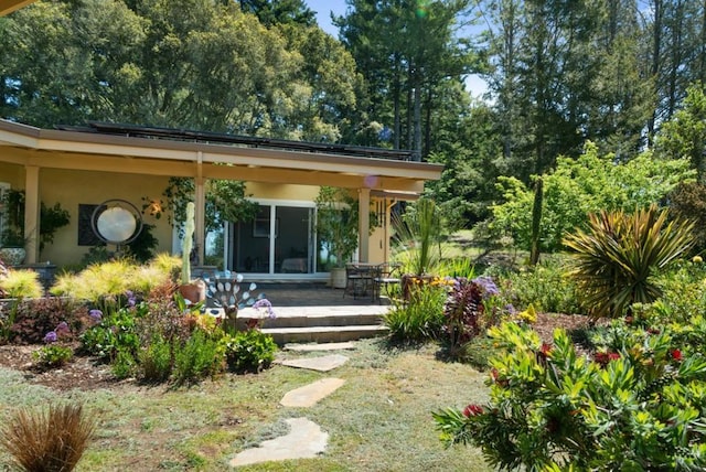 rear view of house with a porch