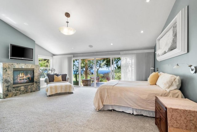 carpeted bedroom featuring access to exterior and lofted ceiling