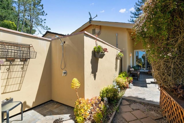 view of home's exterior with a patio