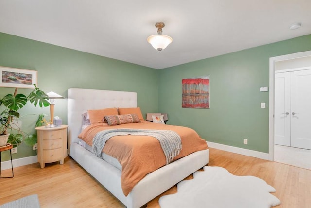 bedroom featuring light wood-type flooring