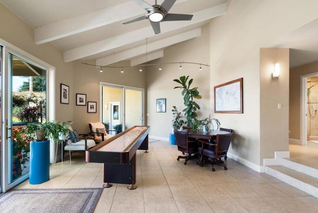 interior space with vaulted ceiling with beams, ceiling fan, and light tile patterned floors