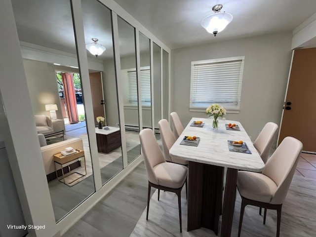 dining area featuring light hardwood / wood-style flooring