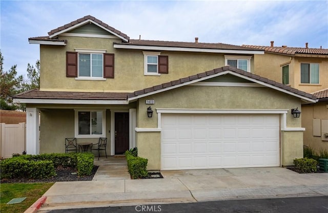 view of front of property featuring a garage