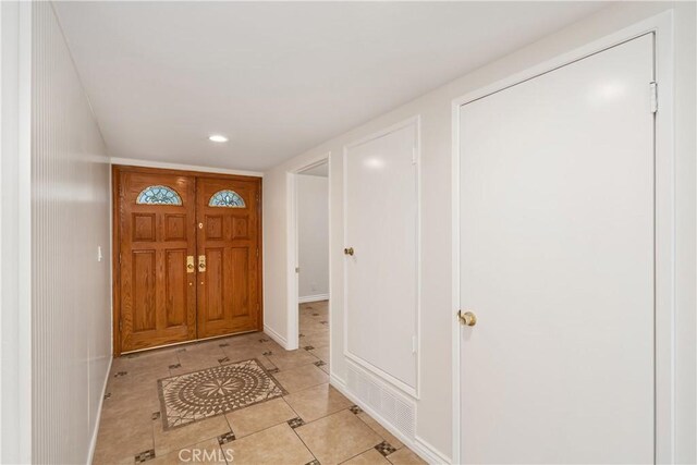 view of tiled foyer