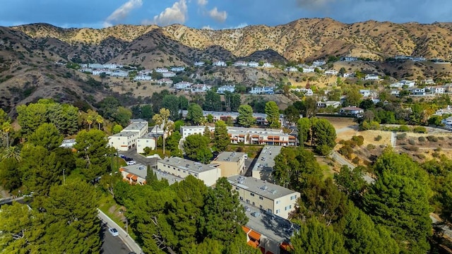 drone / aerial view featuring a mountain view