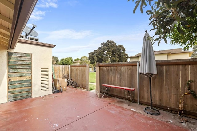 view of patio with fence