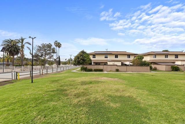 view of yard with fence