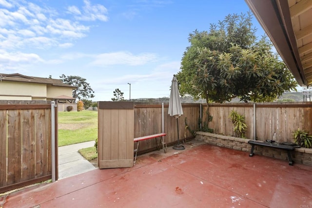 view of patio / terrace with fence