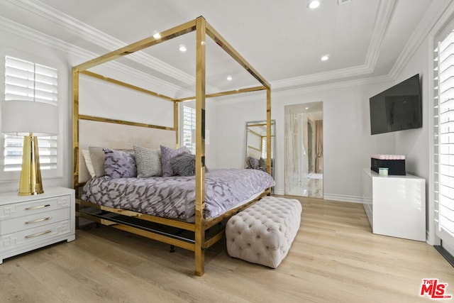 bedroom featuring light hardwood / wood-style flooring, multiple windows, and crown molding