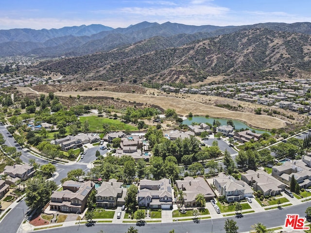 aerial view with a water and mountain view