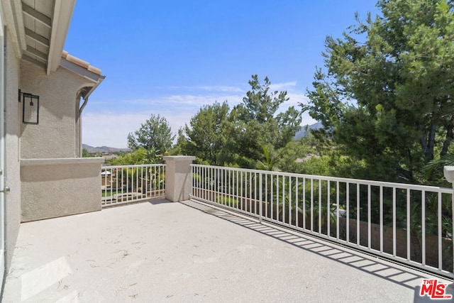 view of patio / terrace featuring a balcony