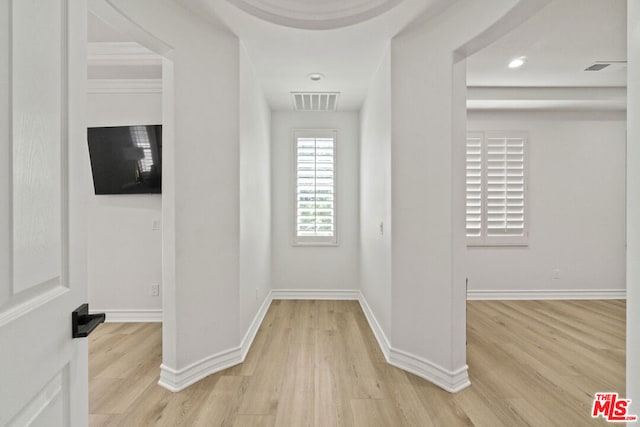 foyer entrance with light hardwood / wood-style floors