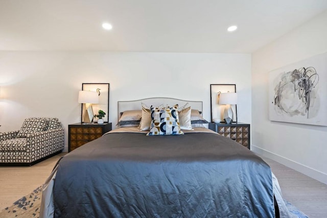 bedroom with wood-type flooring