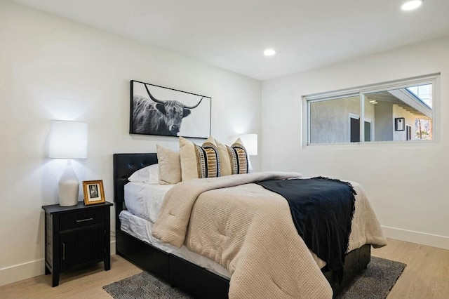 bedroom featuring light wood-type flooring