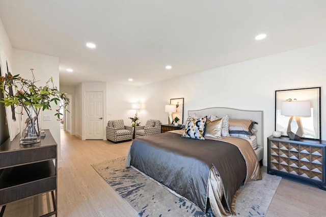 bedroom with light hardwood / wood-style flooring