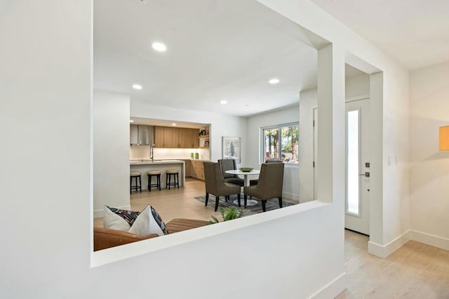 interior space featuring light hardwood / wood-style flooring and sink