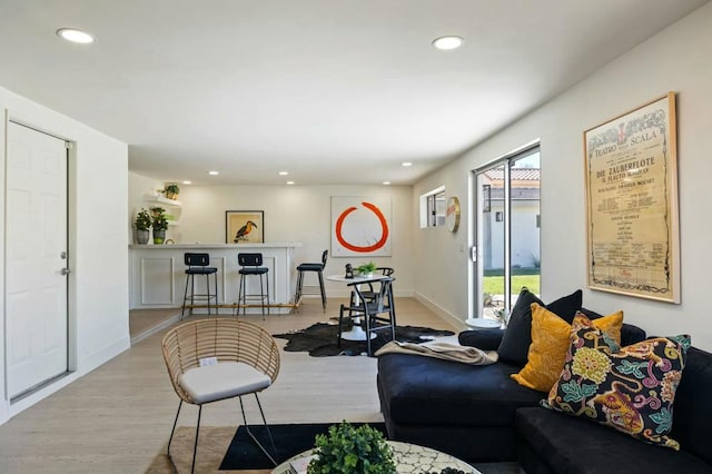 living room with light hardwood / wood-style floors