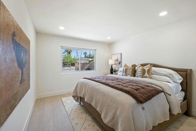 bedroom with light wood-type flooring