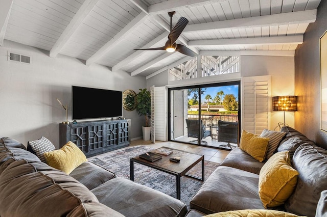 tiled living room featuring beamed ceiling, ceiling fan, and high vaulted ceiling