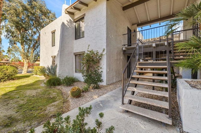 view of property exterior featuring a yard