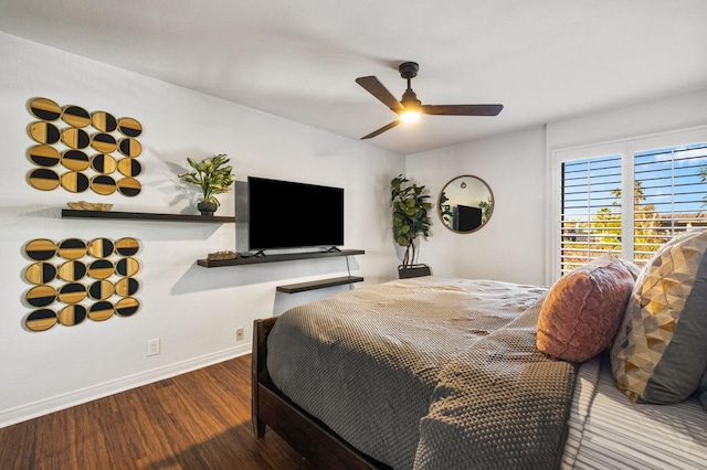 bedroom featuring hardwood / wood-style floors and ceiling fan