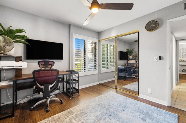 office featuring ceiling fan and hardwood / wood-style flooring