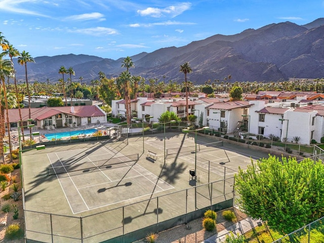 view of sport court with a mountain view