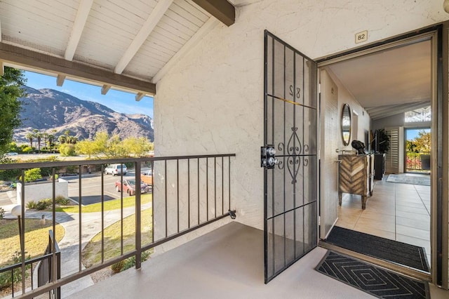 balcony featuring a mountain view