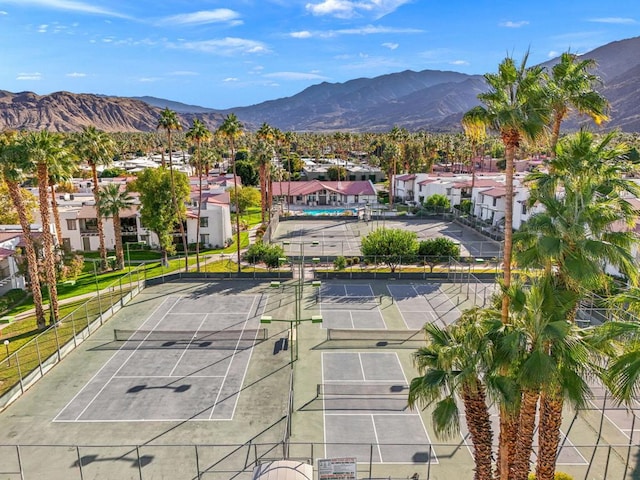 drone / aerial view featuring a mountain view